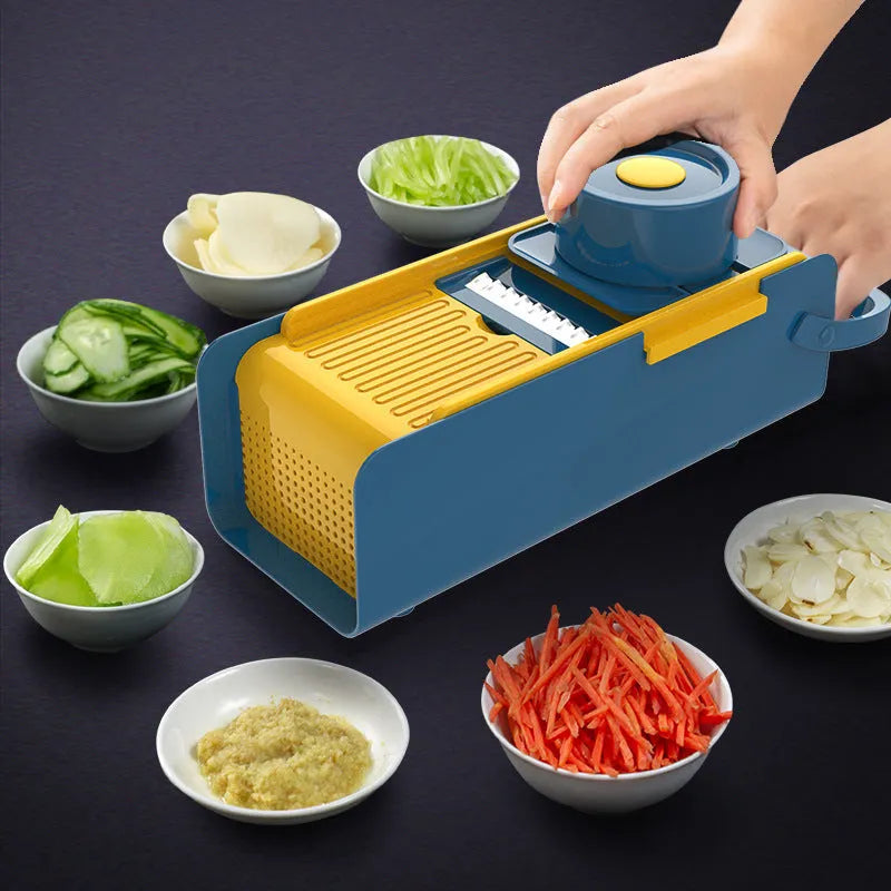 27cm hand-push vegetable cutter with stainless steel blades and protective guard on countertop