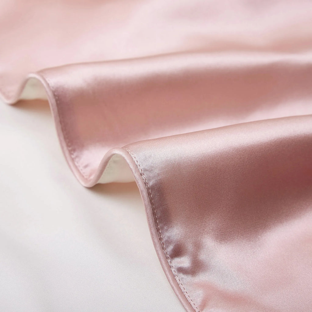 Single silk pillowcase in Bean Paste Purple colour, showing smooth mulberry silk texture and 48 x 74 cm size.
