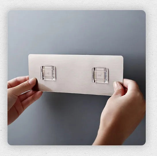 Modern white plastic kitchen knife rack with non-slip strip for wall or drawer mounting.
