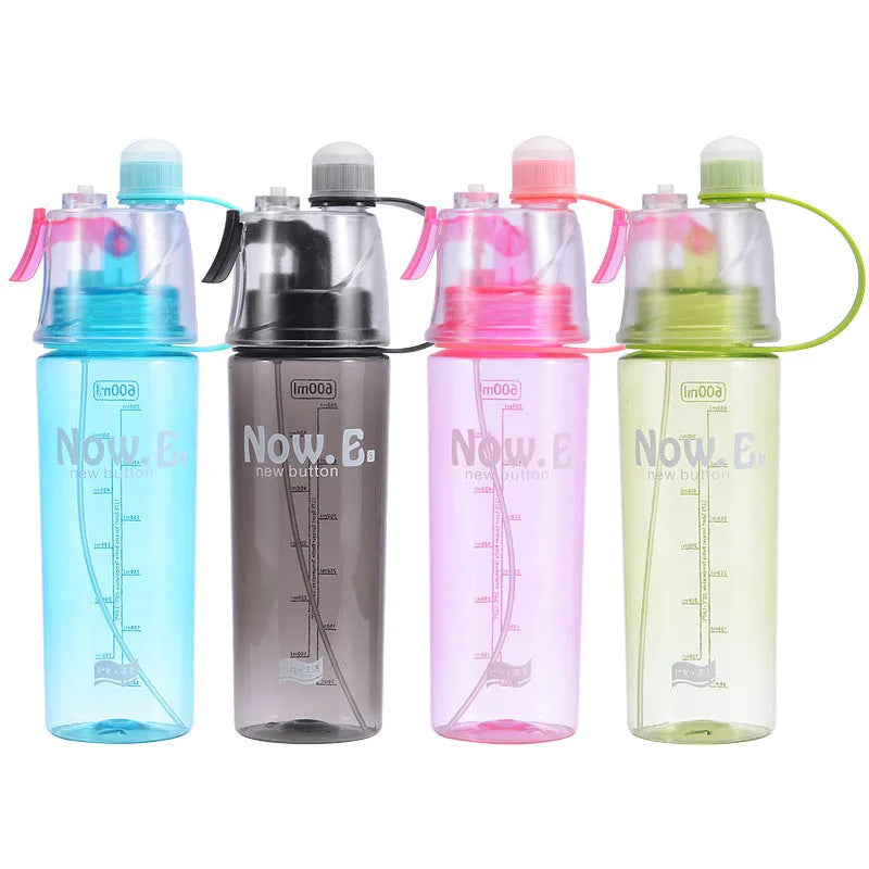 Portable outdoor mist spray water cup with transparent body, handle, and spray nozzle in green colour