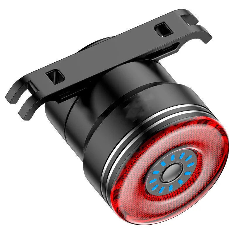 Black aluminium smart brake sensing USB charging bicycle taillight showing 35x39x58mm dimensions