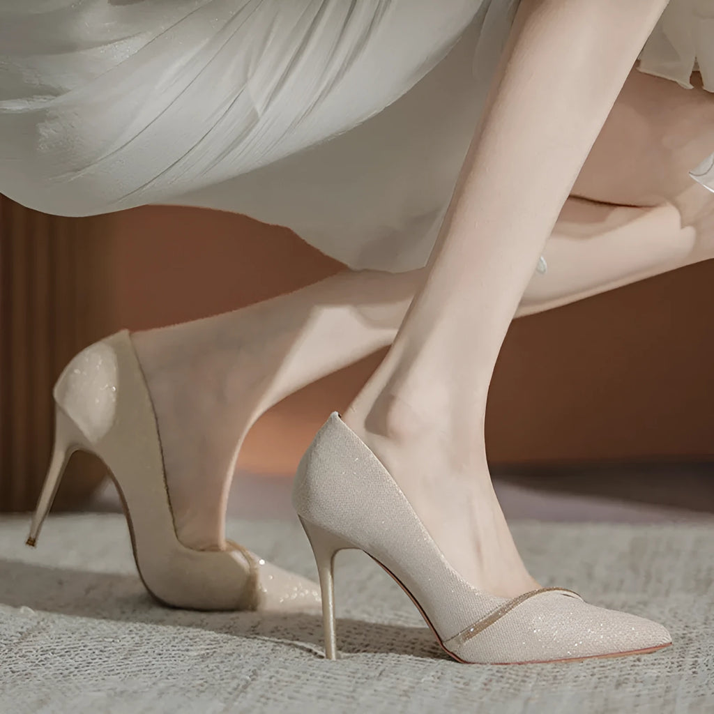 Gold and black women's stiletto high heels with pointed toe, shown in 6cm and 9cm heel options.