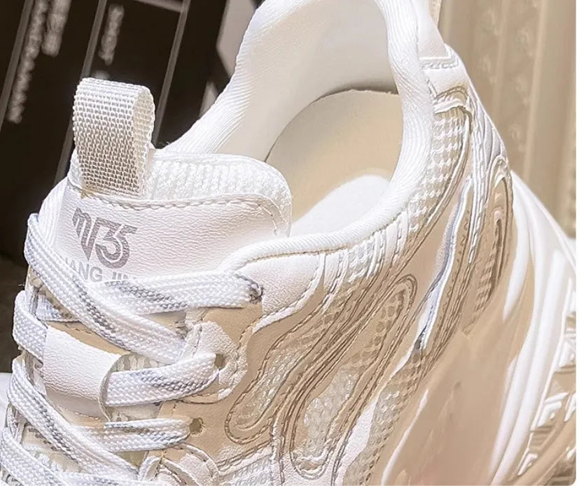 White women's lace-up dad shoes with a round toe and PU leather upper, featuring a hidden height increasing insole.