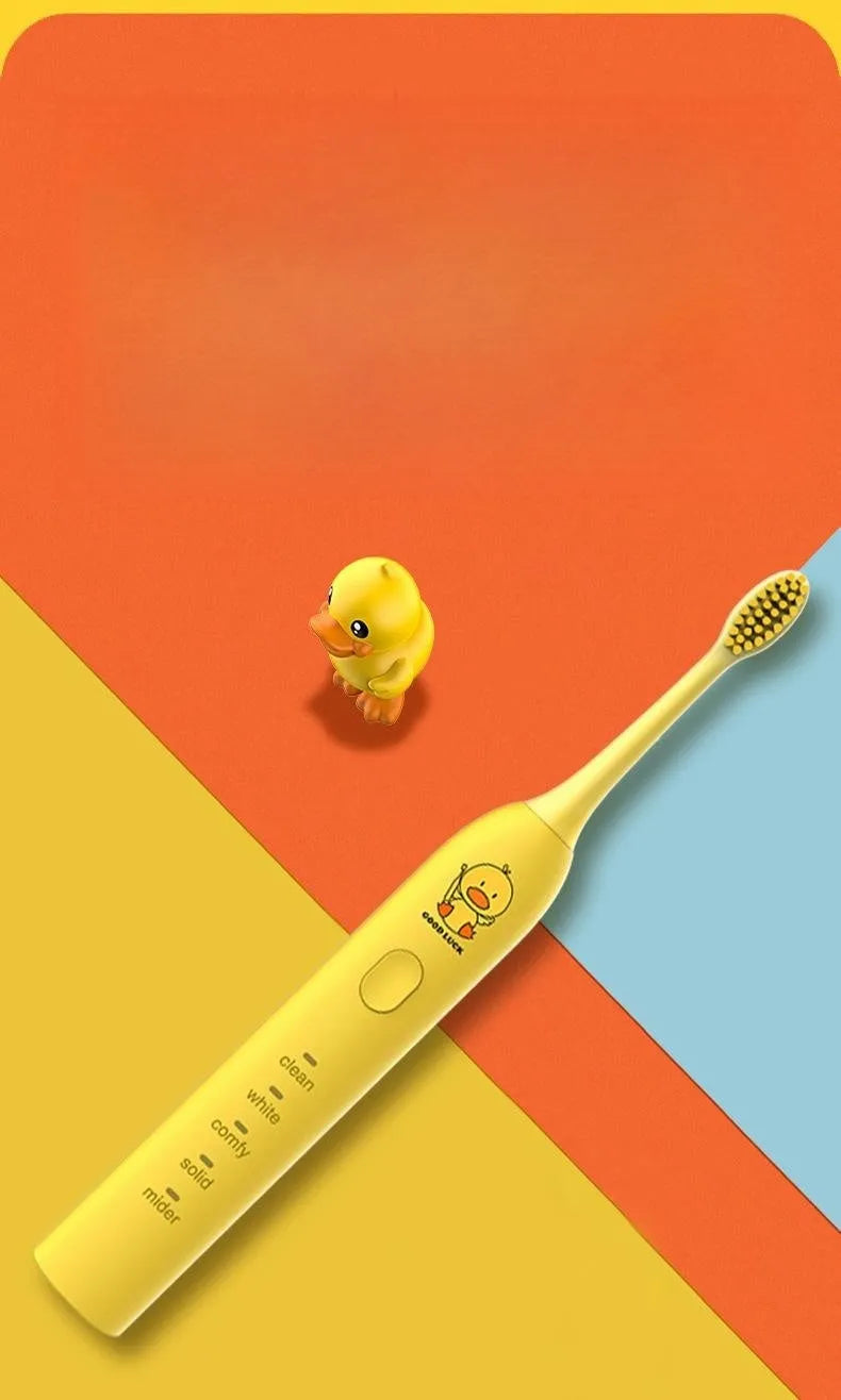 Yellow duck designed rechargeable electric toothbrush with USB port and soft bristle head.