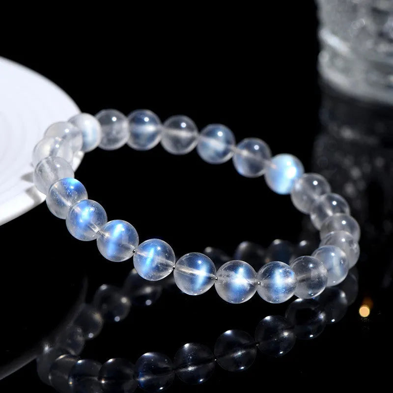 Natural cream body blue moonlight crystal bracelet with grinding treatment and unisex design