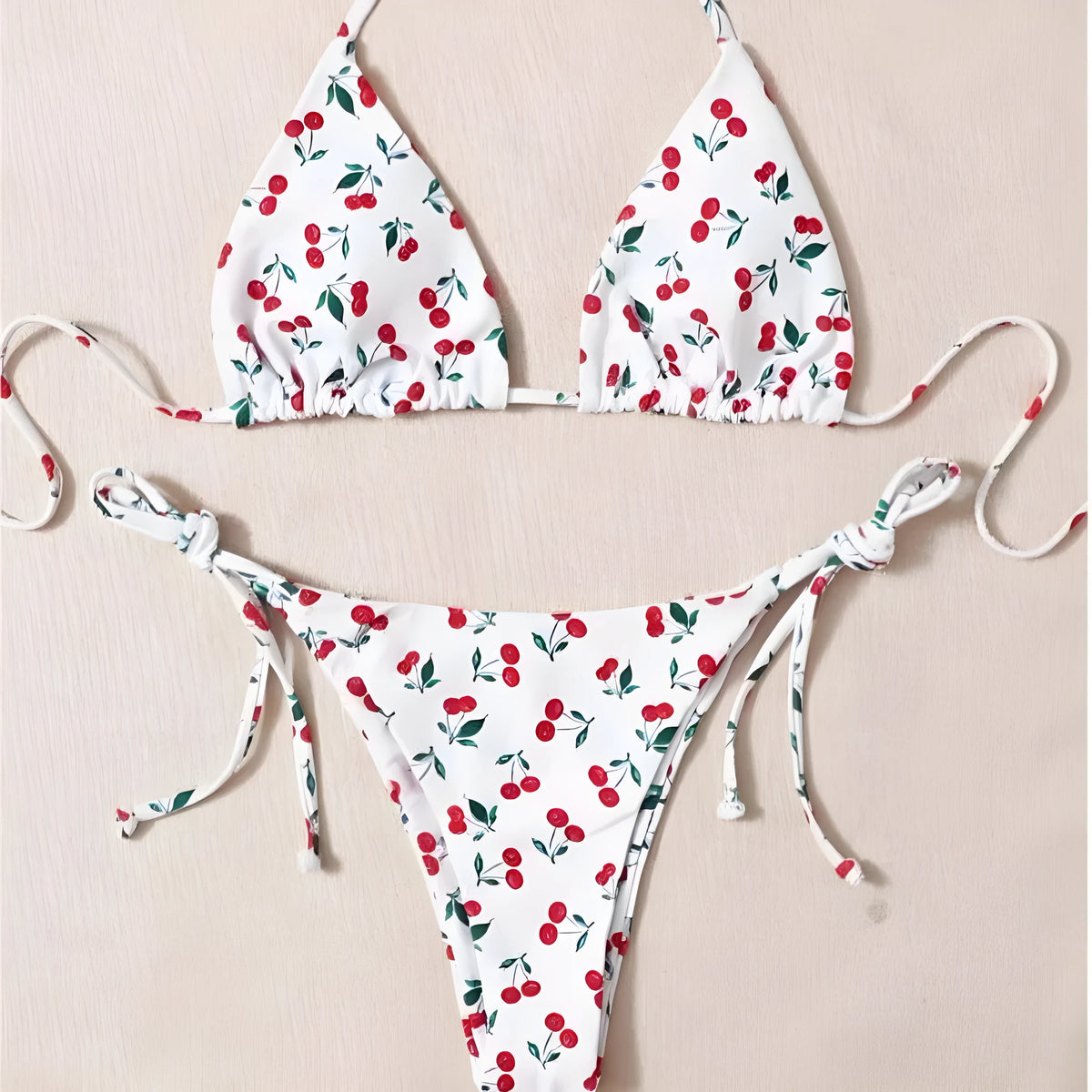 Solid colour women's halter bikini set with briefs and backless design.