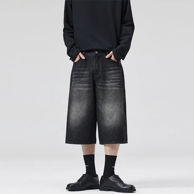 Men's cropped denim shorts in light blue with straight-leg design and five-pocket configuration