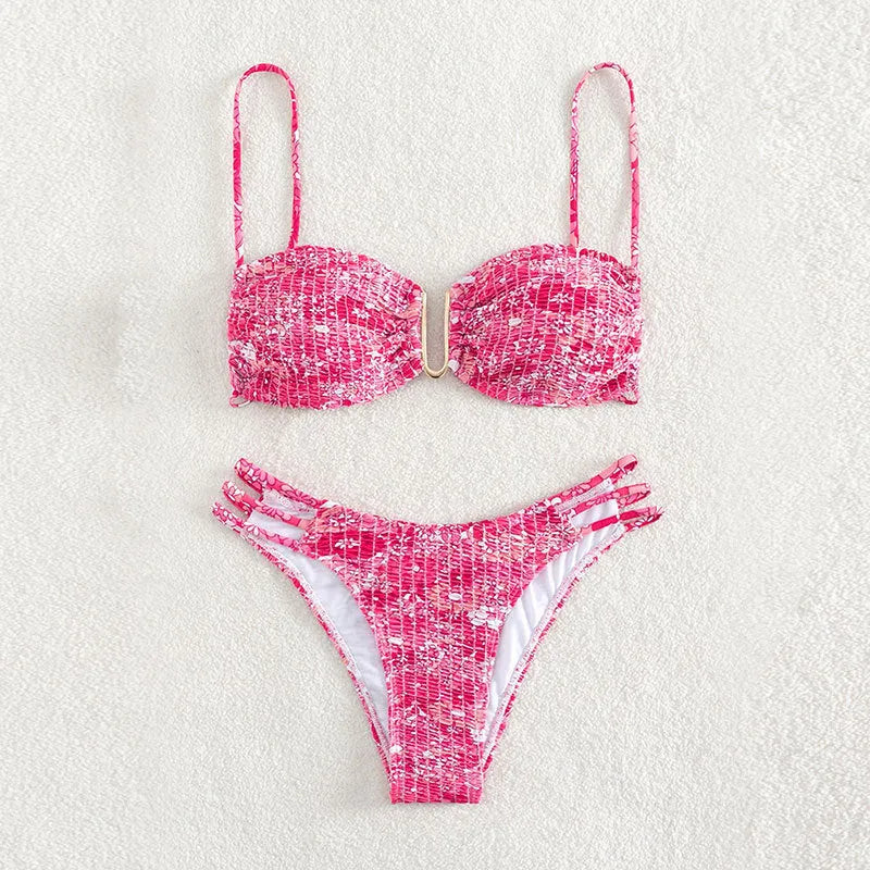 Women's floral high-waist bikini swimsuit set in solid blue colour with matching bra.