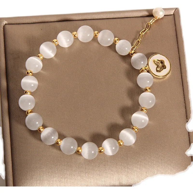 White geometric crystal cat's eye bracelet with adjustable closure in Korean health care style