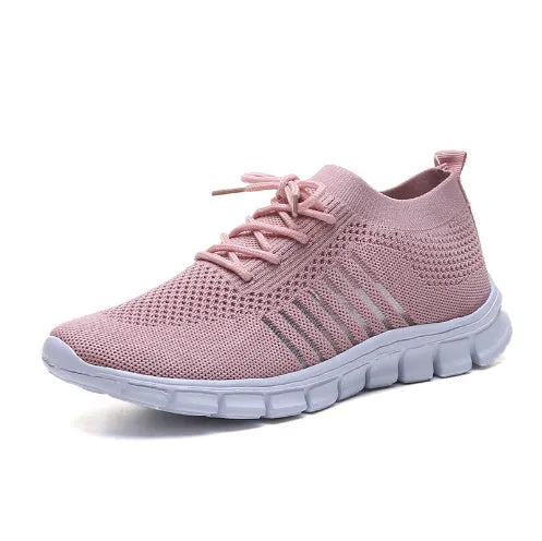 Women's breathable platform sneakers in multiple colours on a white background, showing lace-up front and flat rubber sole.