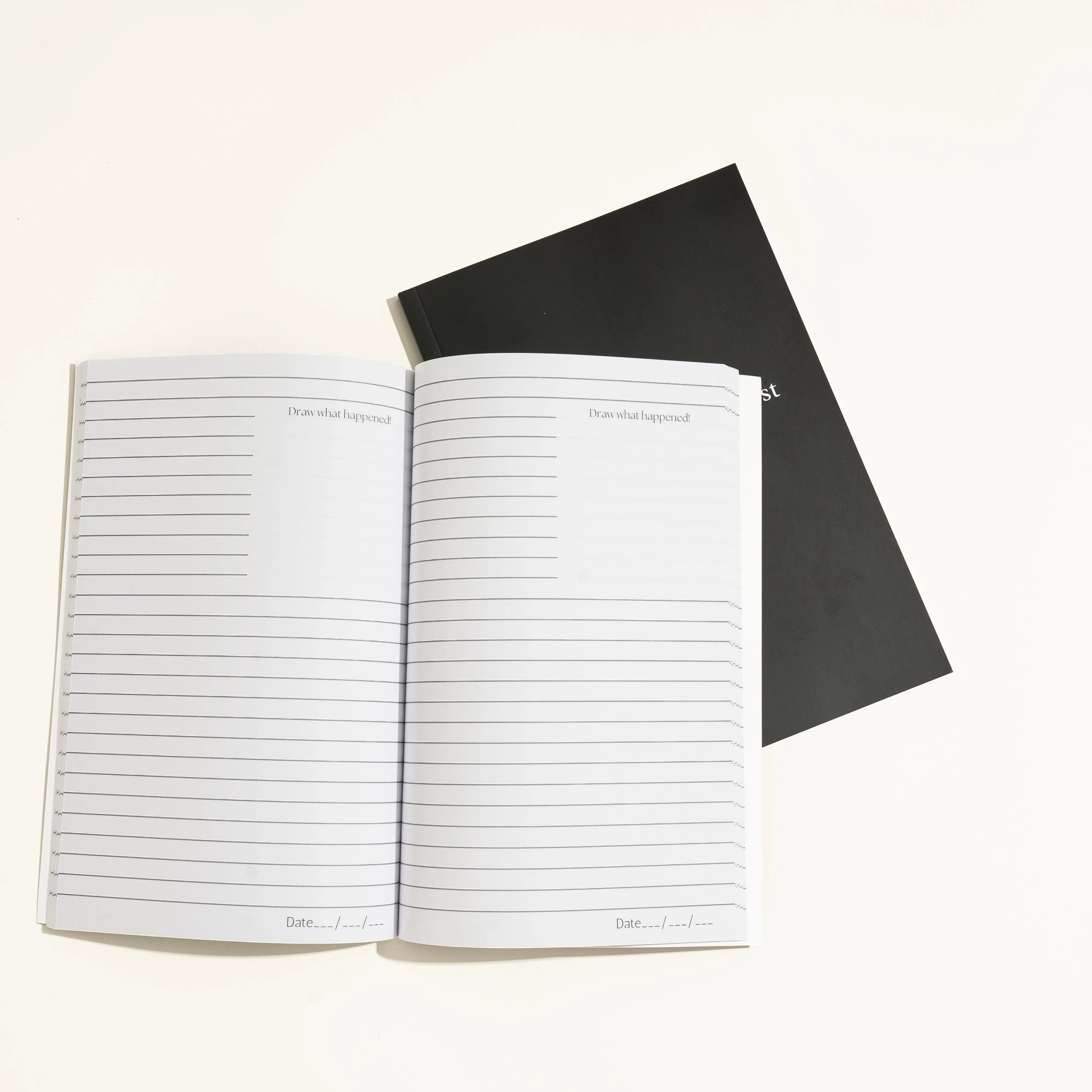 Black A5 hardcover dream journal with 192 unlined pages and a ribbon marker