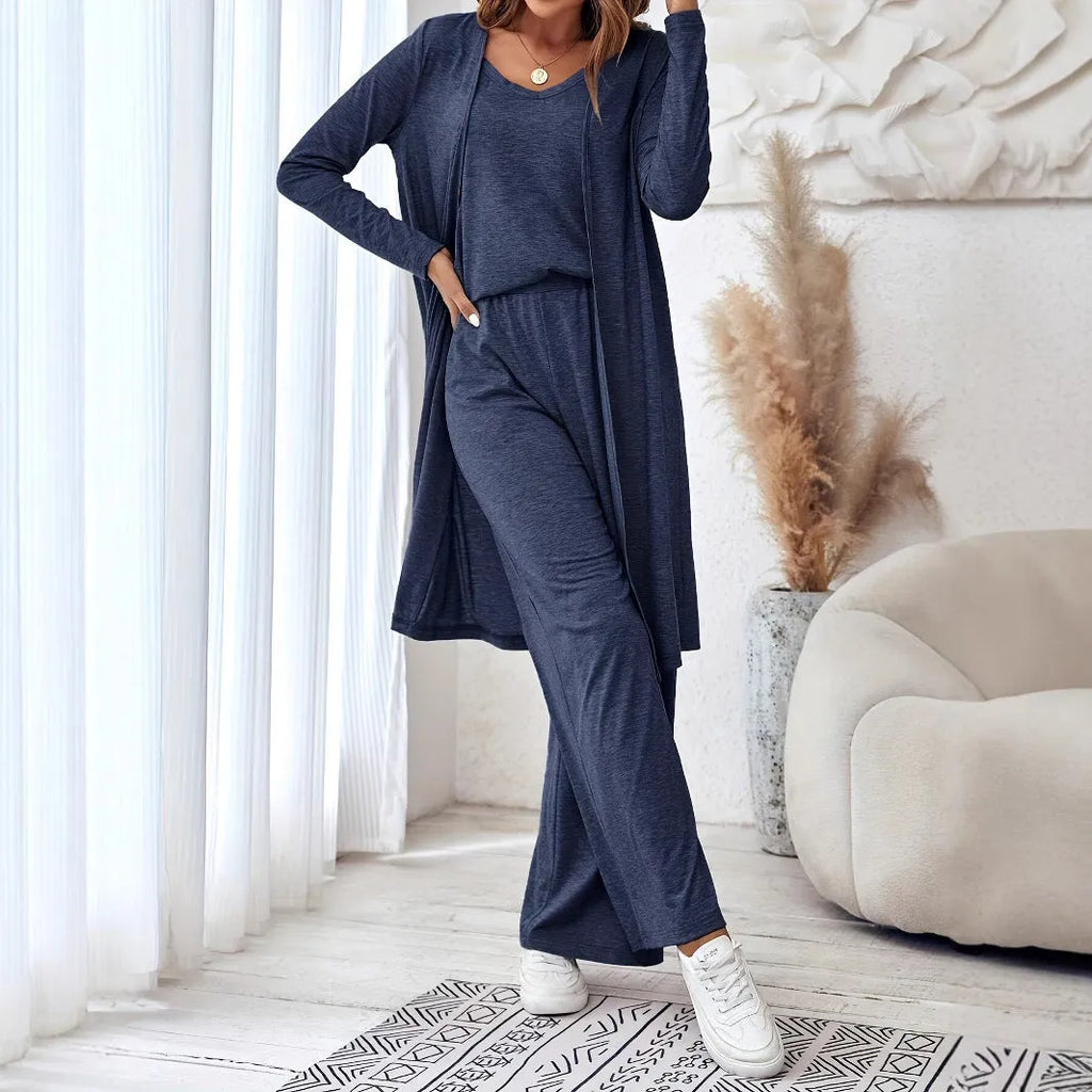 Women's blue polyester casual suit set with trousers, long sleeve top, and suspenders on hanger