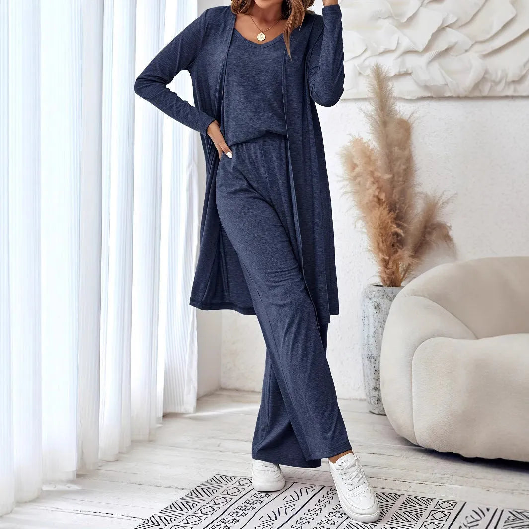Women's blue polyester casual suit set with trousers, long sleeve top, and suspenders on hanger
