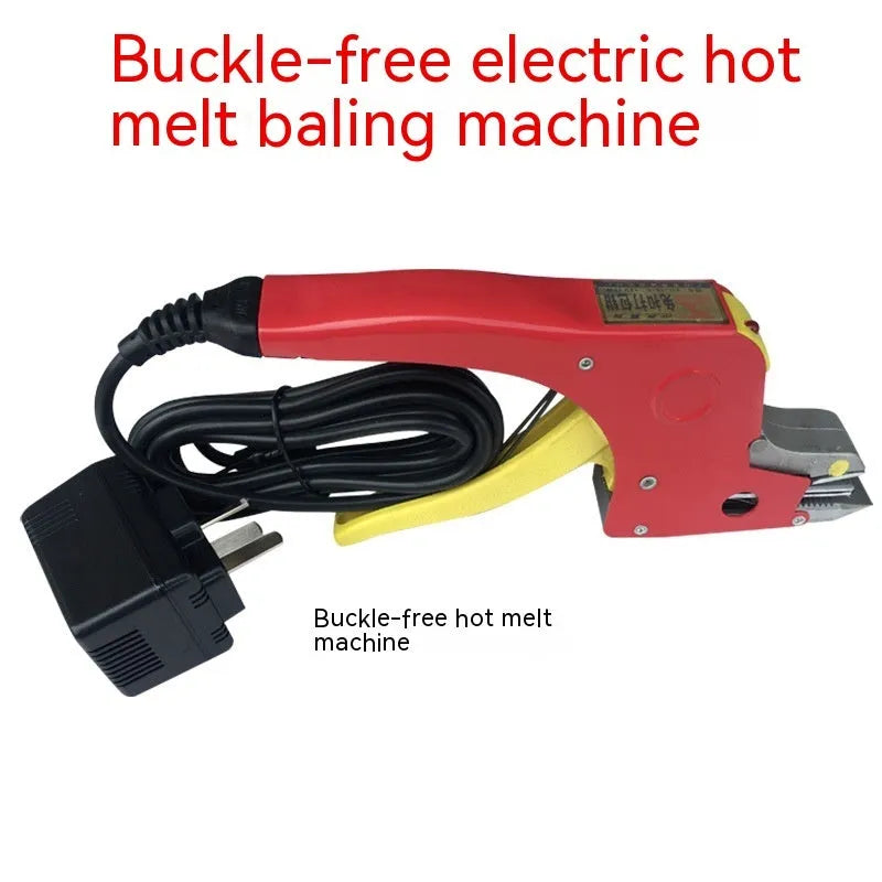 Electric hot melt packing machine with plastic steel tensioner and roll of yellow packaging tape on a work surface.