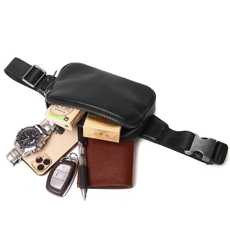 Men's small leather crossbody bag in cowhide showing compact dimensions and urban simplicity styling