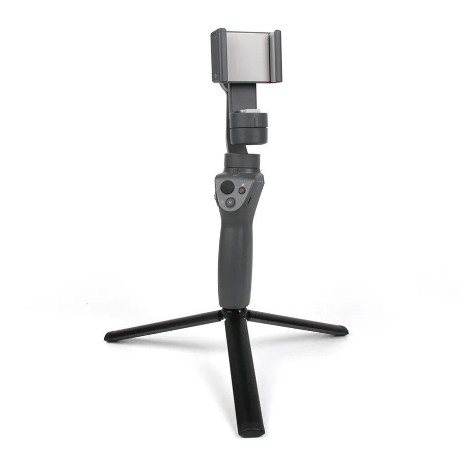 Black aluminium mobile phone tripod extended to 150cm height with 360-degree rotation capability