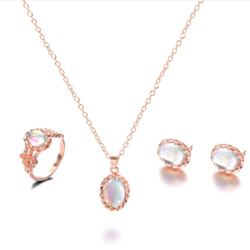 Women's alloy pendant necklace set with electroplated finish, inlaid gems, earrings, and hand accessories