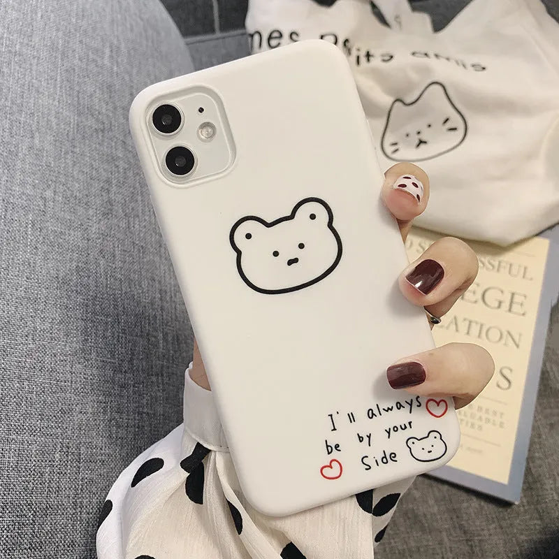 Soft silicone iPhone case featuring a Korean bear cartoon design on the back.