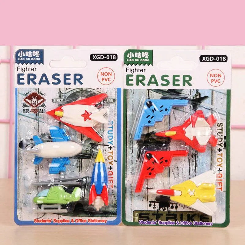 24 colourful mini novelty erasers with 3D shapes including cars, animals, food, and fantasy characters on a white background.