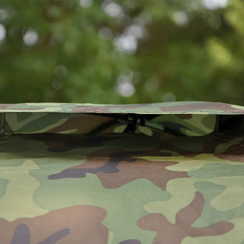 Green camouflage tent with steel ground nails, triangular skylight, and mesh panels for outdoor use