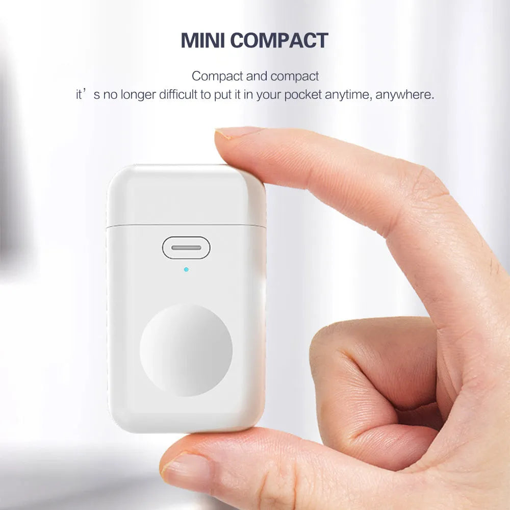 White Apple Watch magnetic wireless portable charger showing compact dimensions