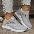 Women's milky white wedge platform casual shoes with lace-up front on a rubber sole.