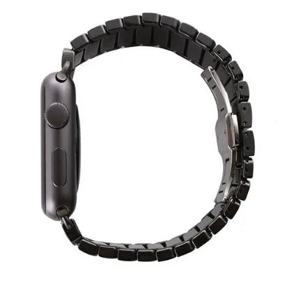 Black ceramic chain link Apple Watch strap with stainless steel clasp on a 42mm watch.