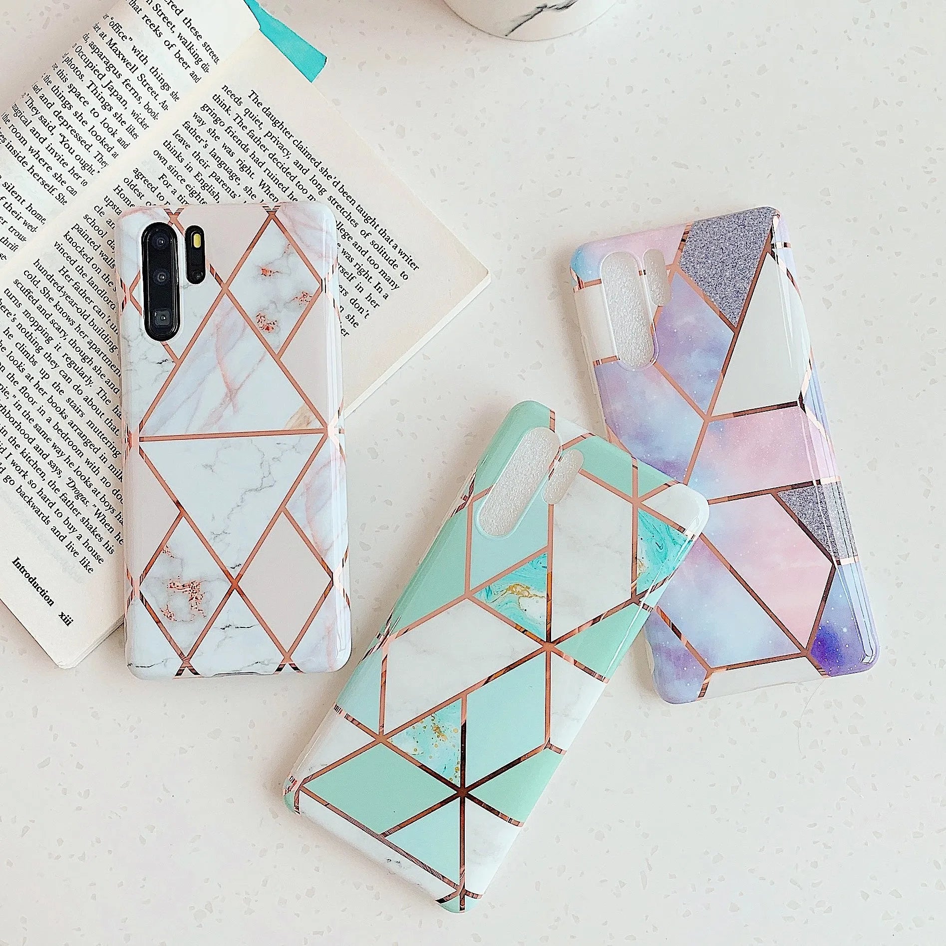 Electroplated marble finish TPU phone case showing back cover design for Huawei and Samsung smartphones