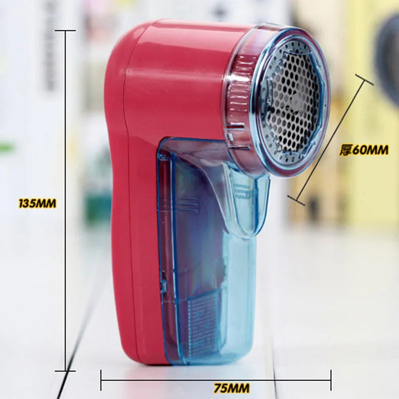 White portable electric lint remover device with USB charging port and removable lint collection compartment