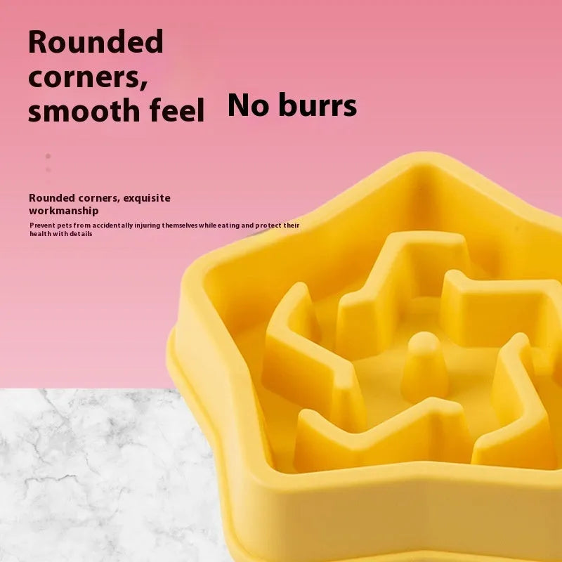 Yellow plastic slow feed dog bowl with textured bottom to prevent choking