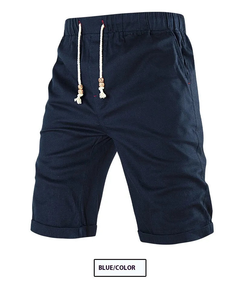 Men's solid colour cotton blend sports shorts with drawstring waist and zipper pocket.