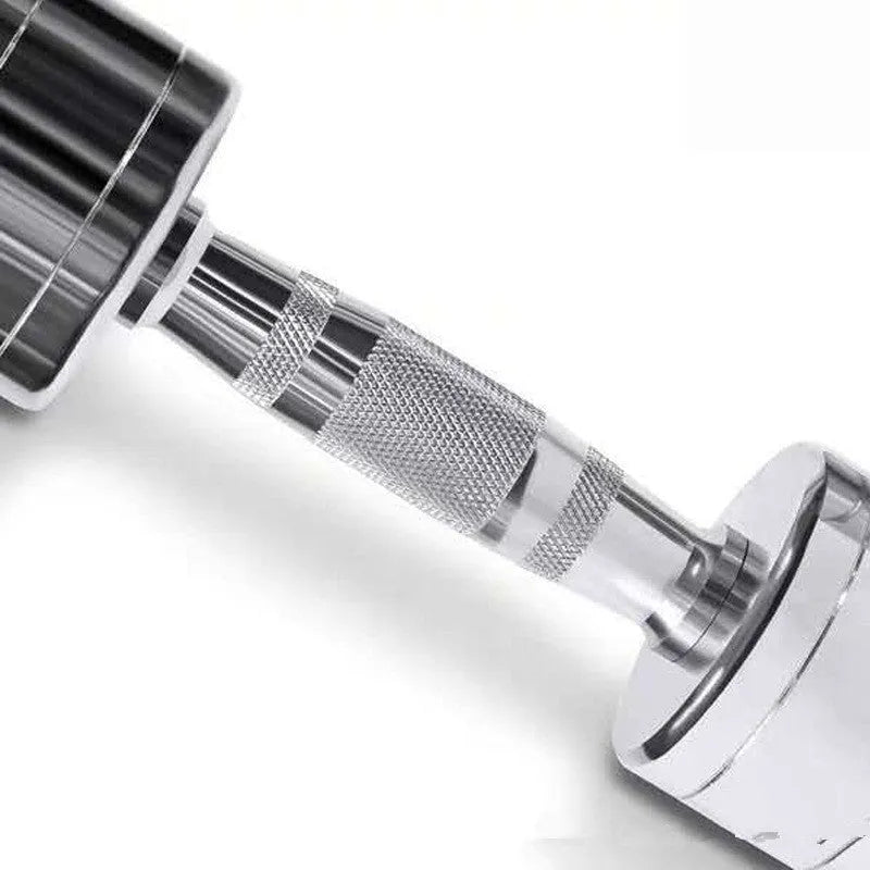 Silver pure steel dumbbell with textured ergonomic handle on a grey background.