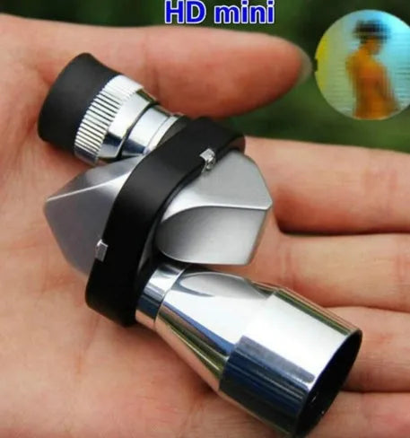 Compact aluminium alloy monocular with 8x magnification and folding rubber eye cover for spectacle wearers