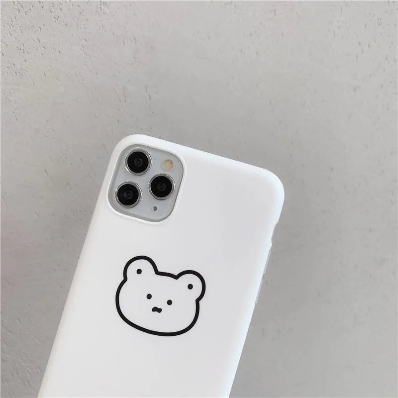 Soft silicone iPhone case featuring a Korean bear cartoon design on the back.