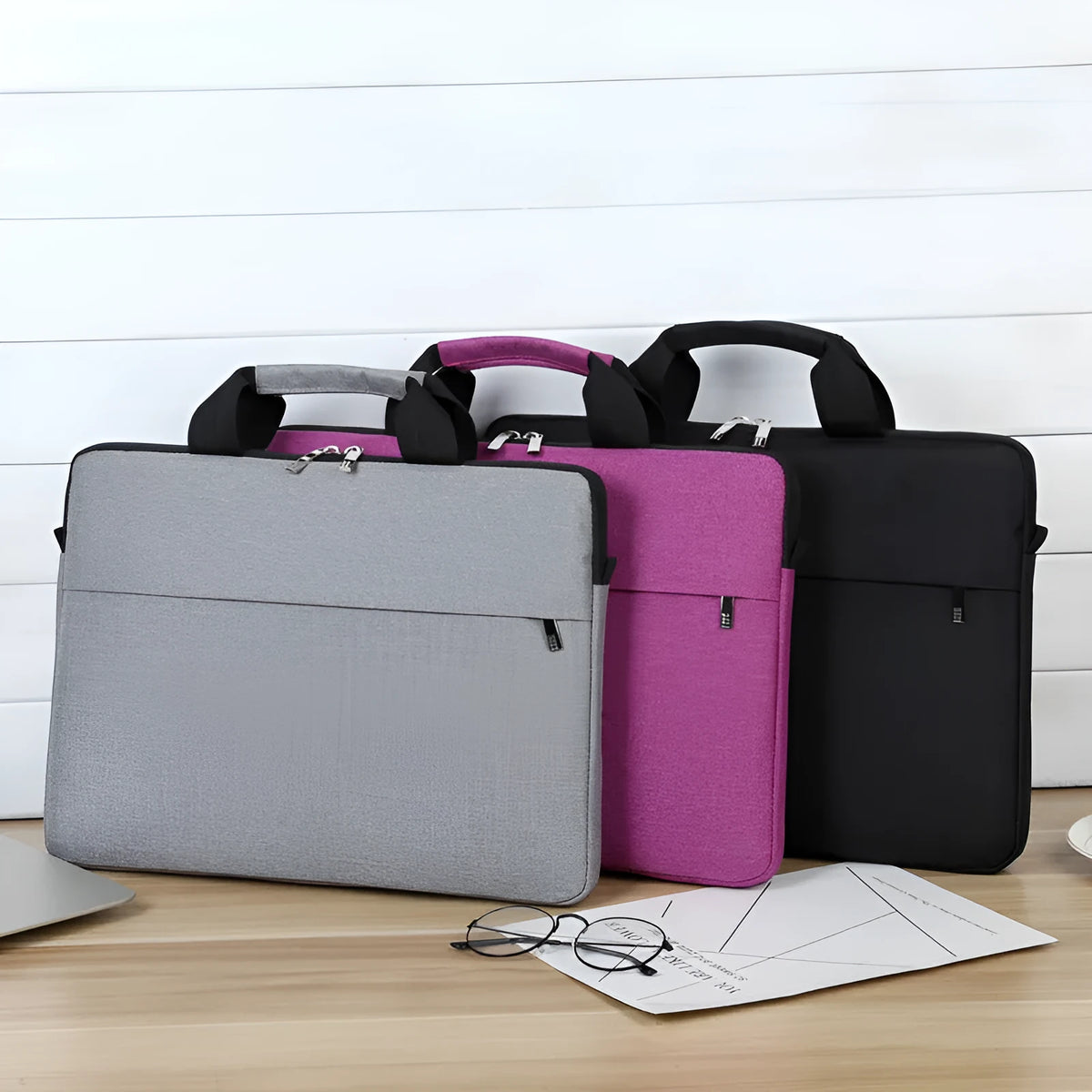 Ultra-thin Oxford cloth laptop shoulder bag for 13-inch notebook with zipper, liner, and zip pocket.