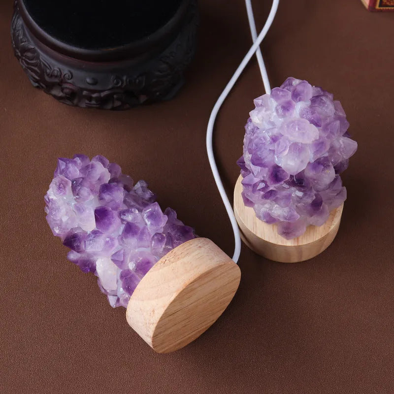 Mini amethyst crystal night light with USB cable, showing natural purple colour and crystalline tooth flower structure.