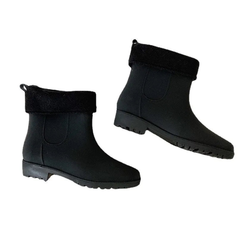 Pair of short rain boots in pink, milky white, or black with non-slip sole and mid-calf length