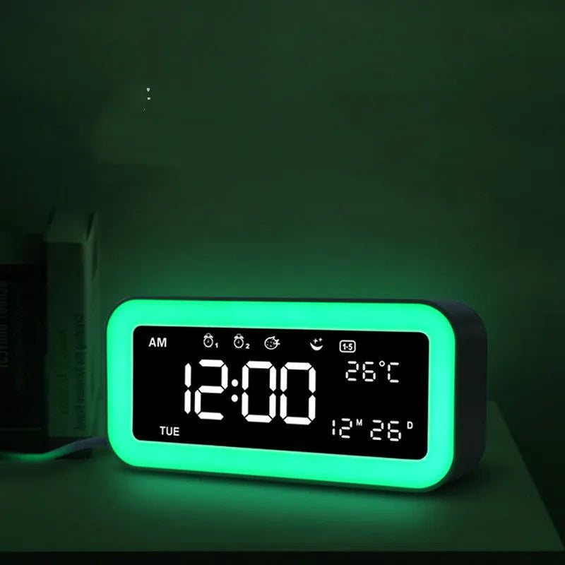 Rectangular LED atmosphere alarm clock in blue or pink with digital display and music function