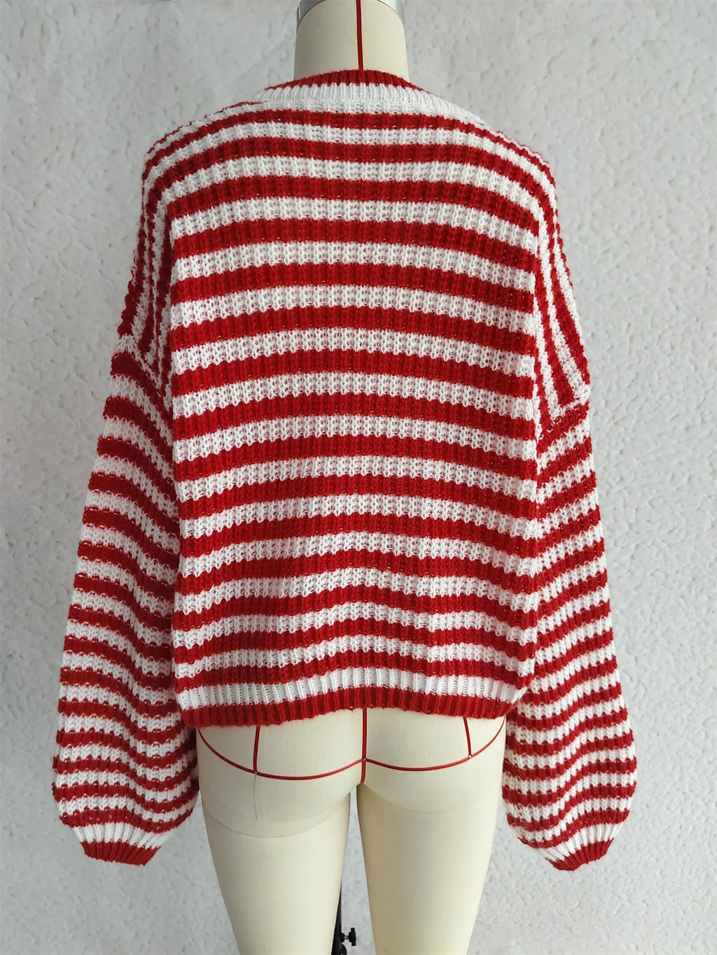 Women's vintage stripe knitted pullover sweater in black with long sleeves and round neck