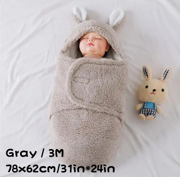 Baby wearing adjustable cotton swaddle sleep sack with velcro closure
