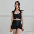 Black nylon swimsuit for women with split brief design