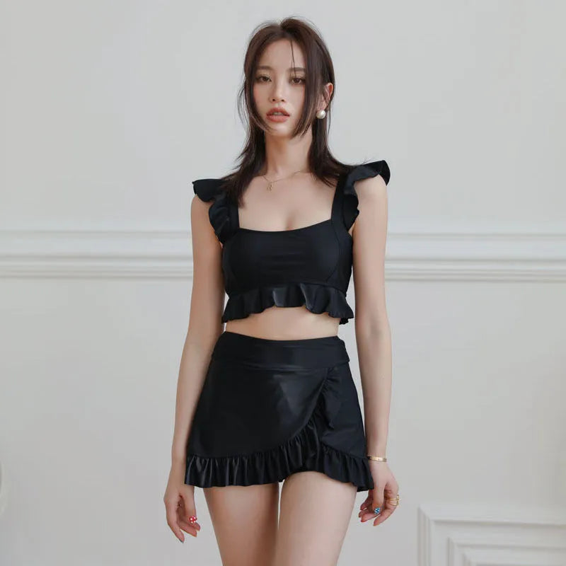 Black nylon swimsuit for women with split brief design