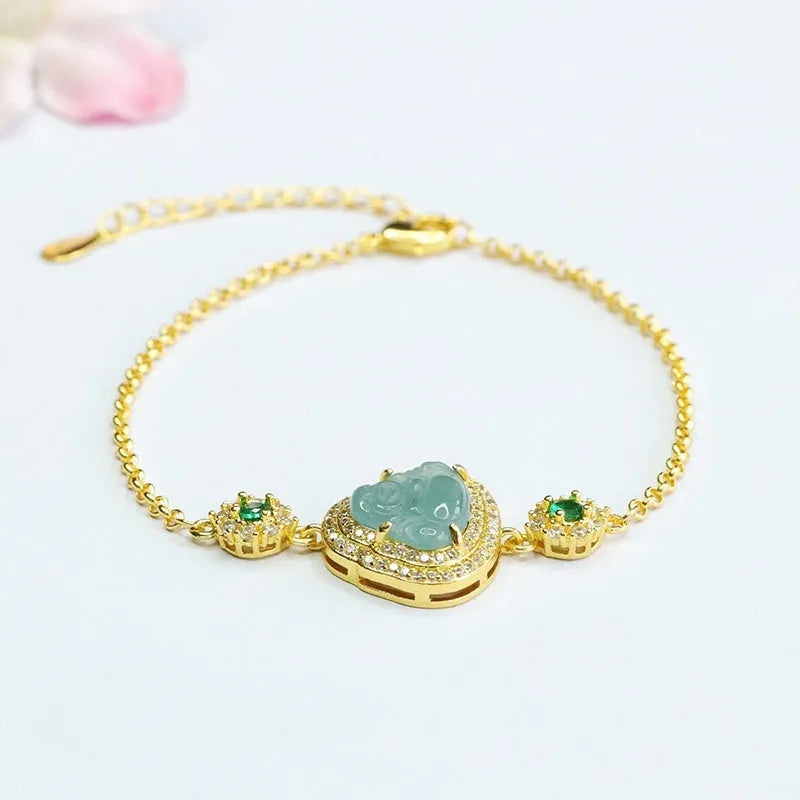 Close-up of a blue water Maitreya Buddha jade bracelet with inlaid details.