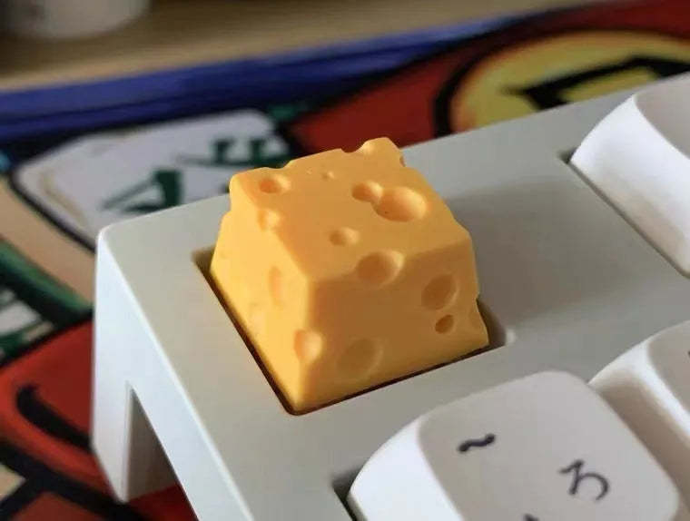 Yellow resin cheese key cap with 3D sculpted texture for mechanical keyboards