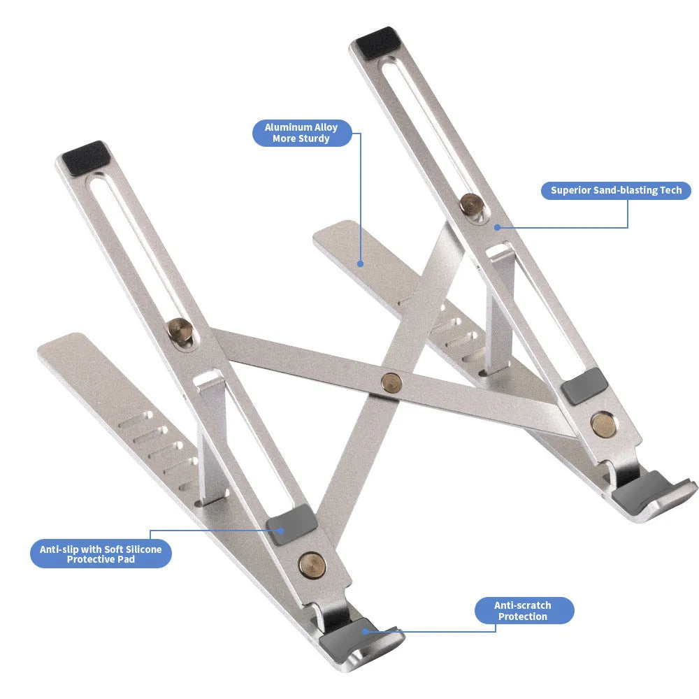 Silver aluminium laptop stand with six-height adjustment gears beside a black laptop on a desk