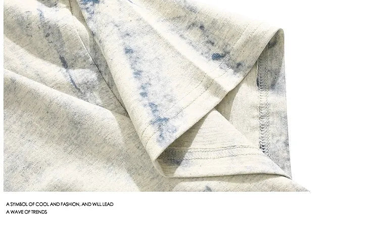 Grey men's t-shirt with an all-over tie-dye pattern, loose fit, round neck, and short sleeves.