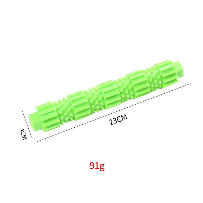 Green durable rubber dog chew toy with treat-dispensing hole and textured surface for aggressive chewers.