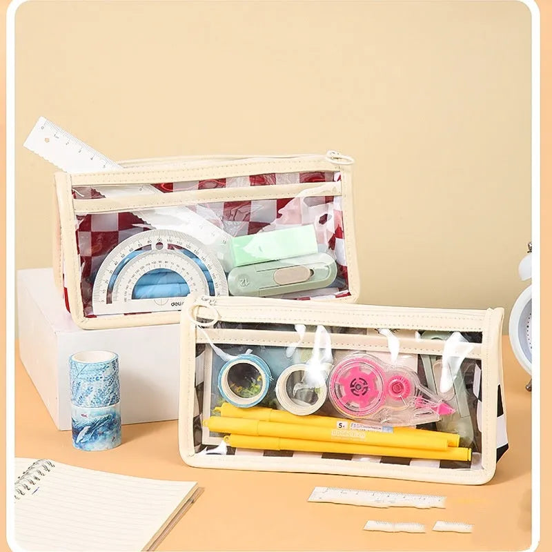 Chessboard pattern transparent PVC pencil case showing pens inside, 21.5cm length with black and white grid design