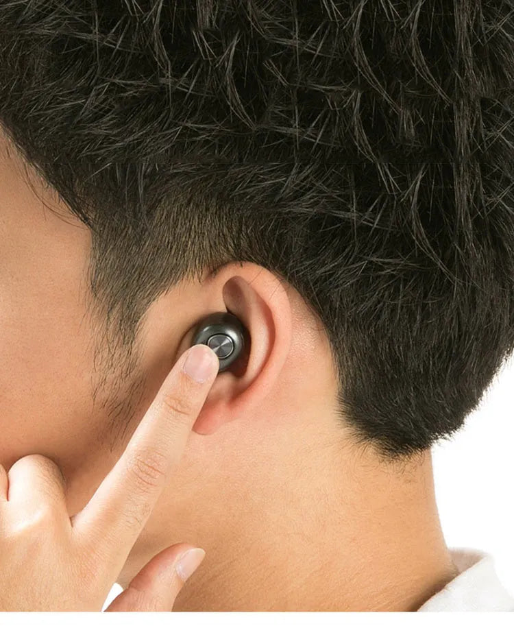Black over-ear wireless Bluetooth headset with adjustable headband and microphone.