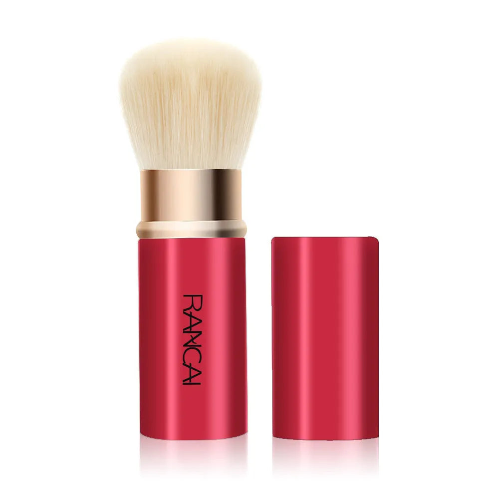 9cm retractable makeup brush with aluminium tube and fibre wool bristles, shown in black and red